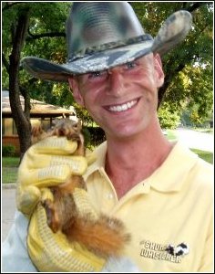 ned bruha with a squirrel he's recently removed